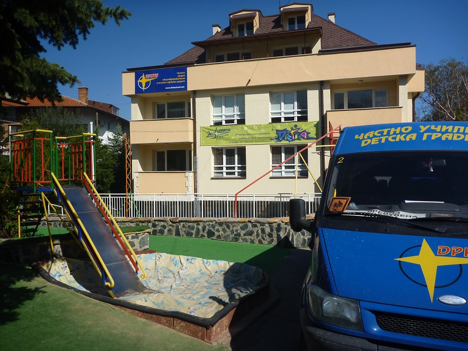 Kindergarten yard and a school bus